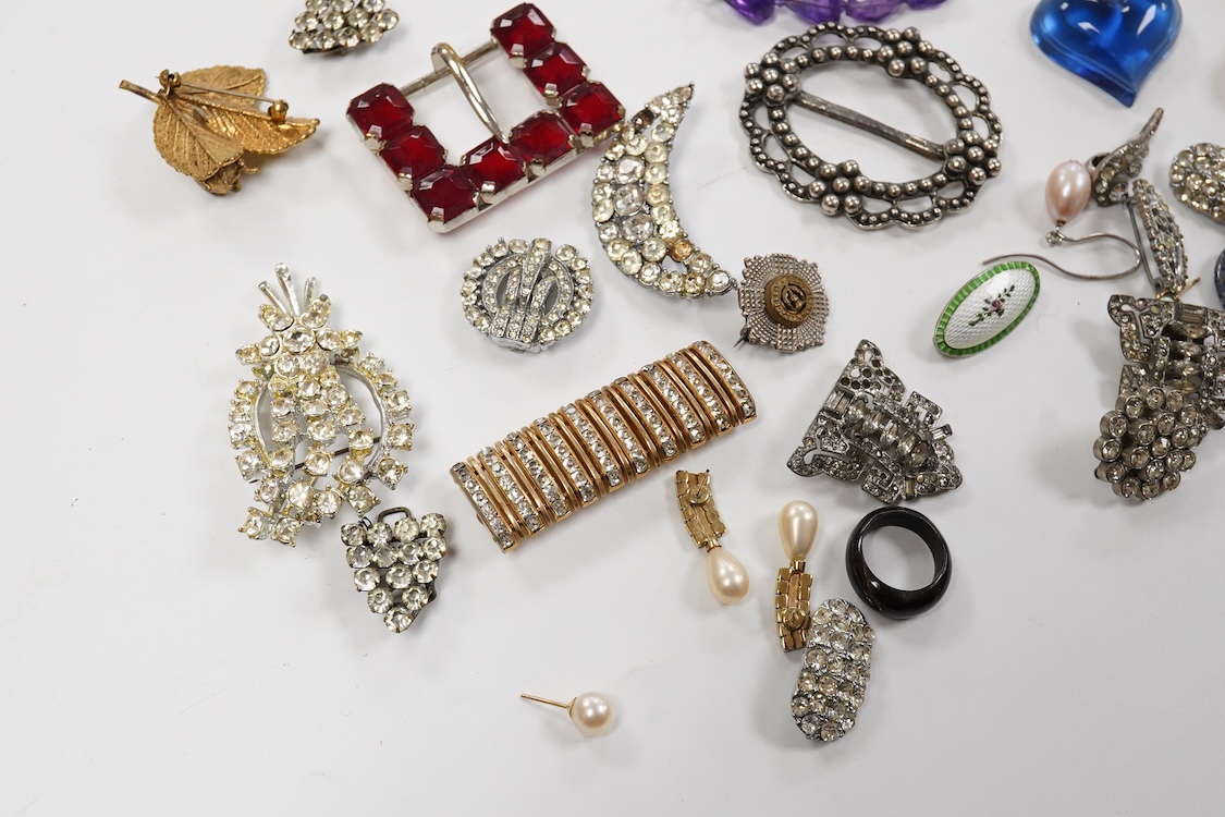 A 9ct and cabochon black onyx set pendant, on a 9ct chain, a 9ct and gem set ring and pair of 9ct and cultured pearl set ear clips, together with other items including costume jewellery, a silver bangle and a silver book